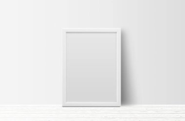 hafif ahşap zemin ve beyaz duvar arka plan boş beyaz fotoğraf çerçevesi