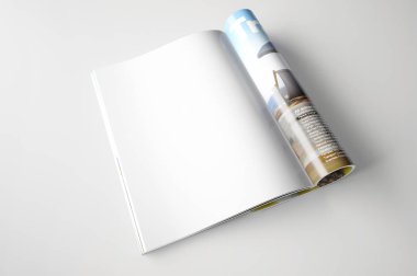 Beyaz arka plan üzerinde boş dergisinin yakın çekim