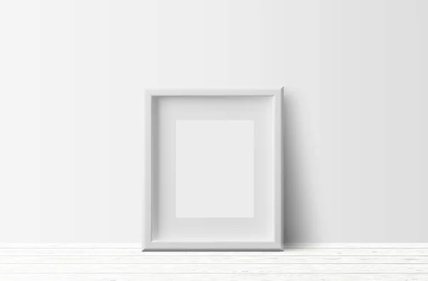 浅色木地板和白墙背景上的空白白色相框 — 图库照片