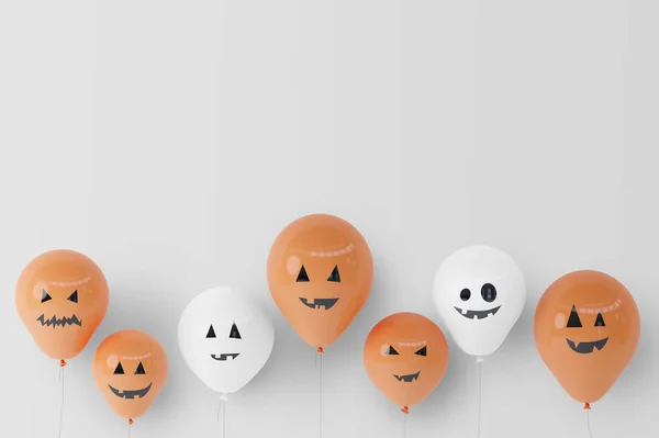 colorful Halloween balloons on white wall background