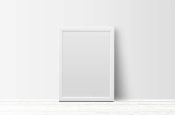 浅色木地板和白墙背景上的空白白色相框 — 图库照片