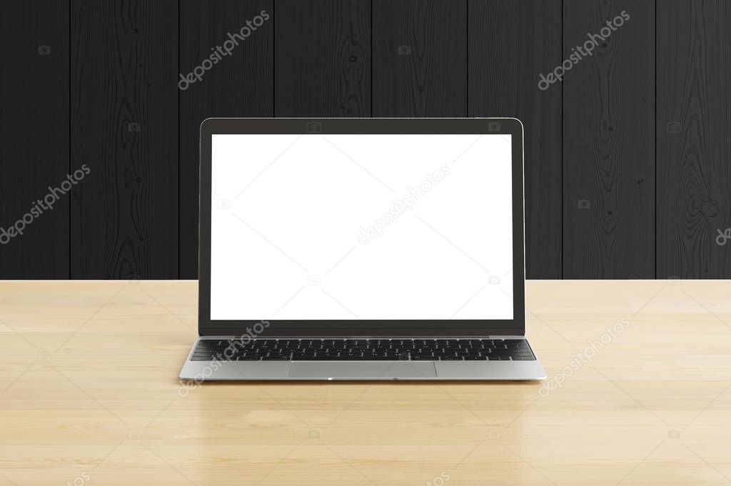 laptop with white empty screen on wooden table 
