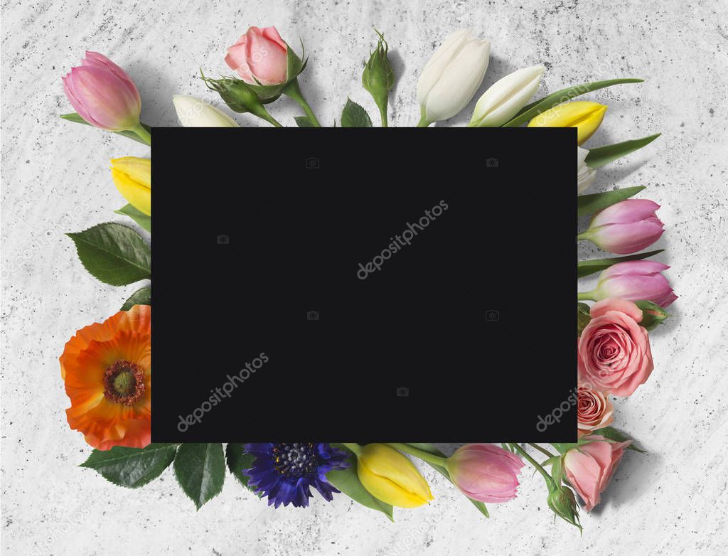 paper card with bright flowers and tropical leaves 