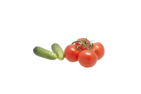 Tomaten en komkommers. — Stockfoto