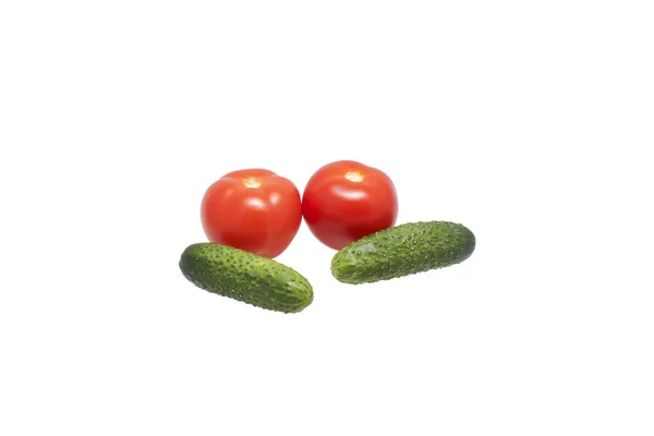 Tomatoes and cucumbers. — Stock Photo, Image