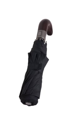 Katlanmış siyah şemsiye.