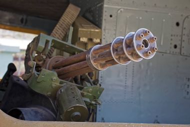 M134 Minigun inside  Huey helicopter at War Remnants Museum in H clipart