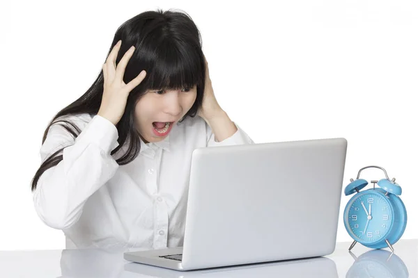 Asian woman sitting at desk stressed isolated on white backgroun — Stock Photo, Image