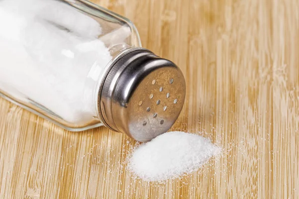 Salt Shaker on a wooden background