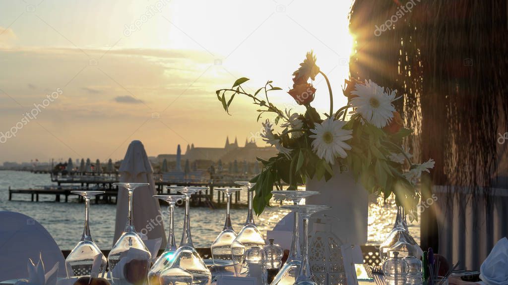 Luxury Table Setting On Pier At Sunset