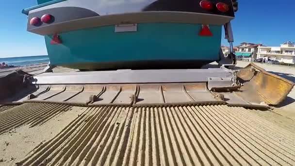 Tractor and Surf Rake Moving and Cleaning Sand — Stock Video