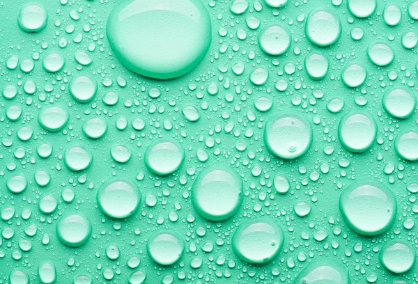 Water drops on a green background Royalty Free Stock Photos