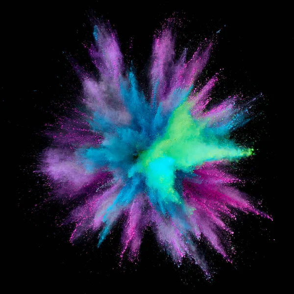 Colored powder explosion. Abstract closeup dust on backdrop. Colorful explode. Paint holi