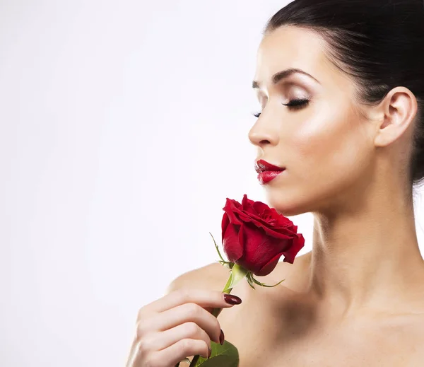 Romantic woman holding red rose on white background — Stock Photo, Image