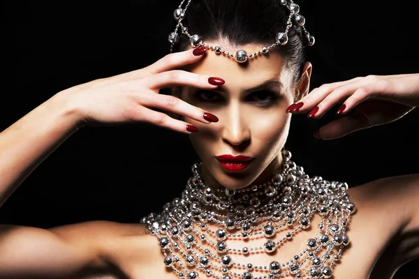 Disco woman wearing silver accessories on black backgound — Stock Photo, Image