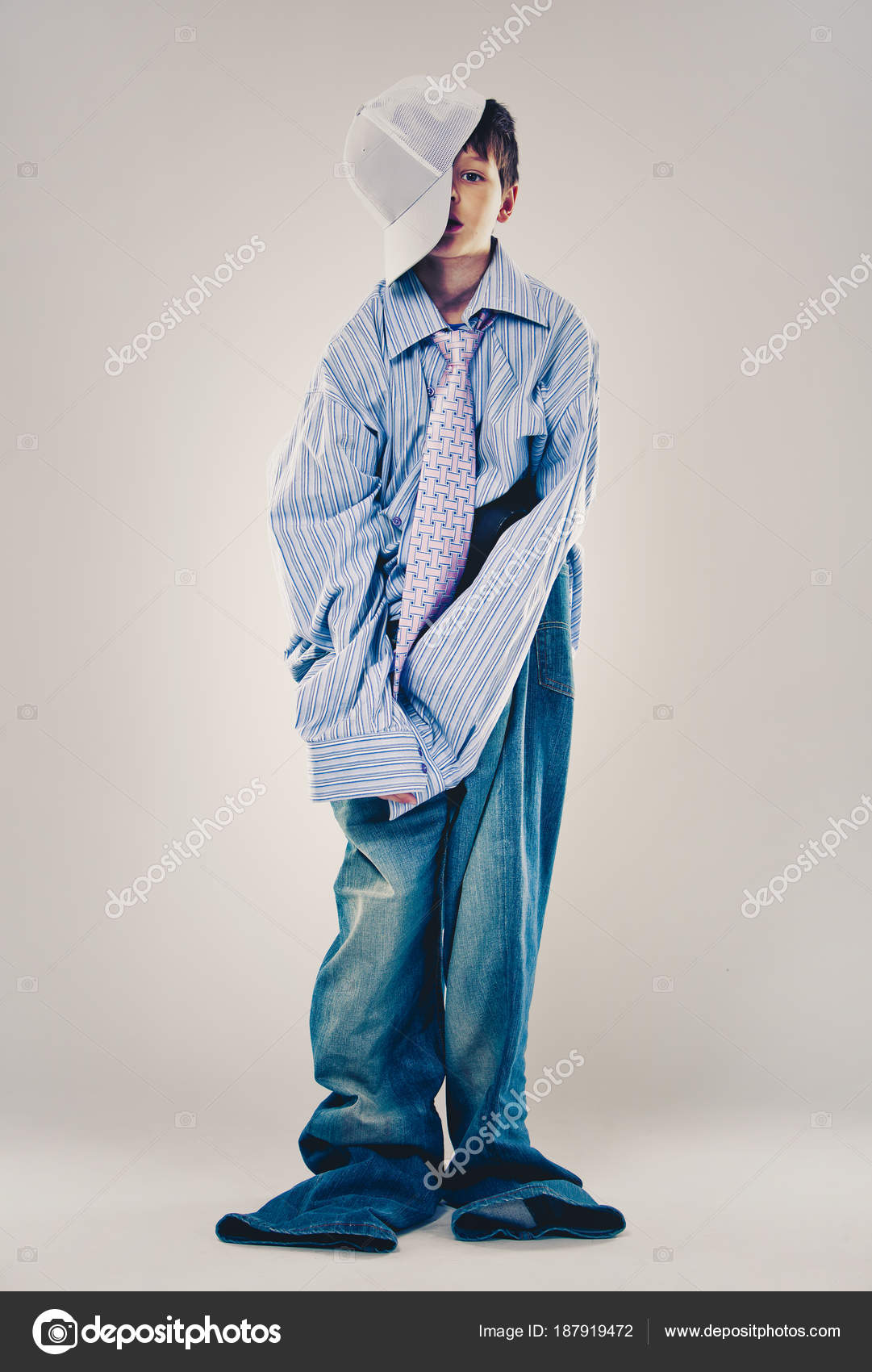 Funny boy wearing Dad's clothes Stock 