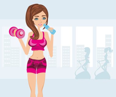 Spor salonunda egzersiz yapan kızlar.