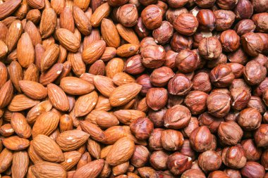 Soyulmuş badem ve fındık arka plan veya doku