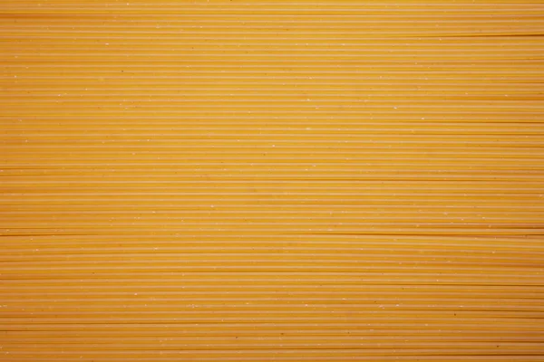 Macaroni, pasta, spaghetti background or texture — Stock Photo, Image