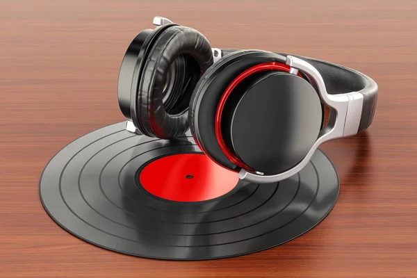 Hörlurar med vinylskiva på trä bordet. 3D-rendering — Stockfoto