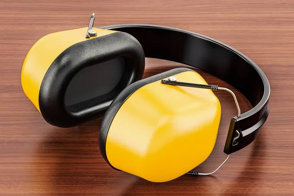Defensores de oído estándar en la mesa de madera. Renderizado 3D — Foto de Stock