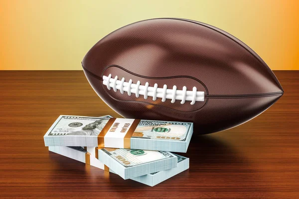 Americký fotbal míč s balíčky dolar na dřevěný stůl, 3d — Stock fotografie