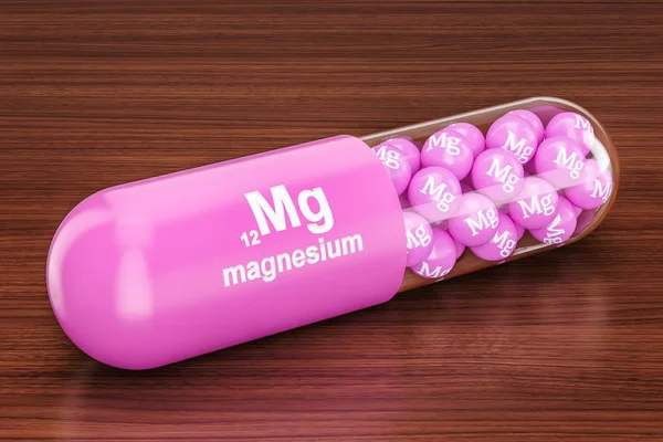 Capsule with magnesium Mg element on the wooden table. 3D render — Stock Photo, Image