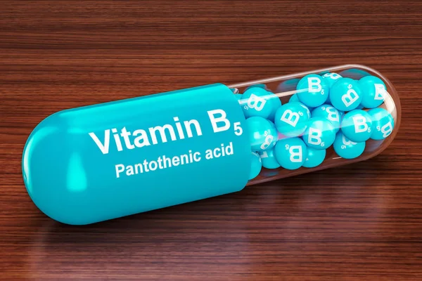 Vitamin B5 kapsel på trä bordet. 3D-rendering — Stockfoto