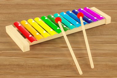 Renkli ksilofon ahşap masa üzerinde. 3D render