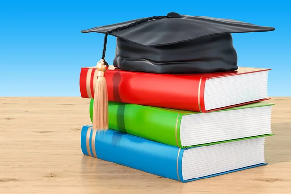 Concepto educativo con libros y gorra de graduación en la ta de madera — Foto de Stock