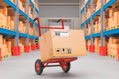 Depoda karton kutulu bir el arabası. Teslimat konsepti