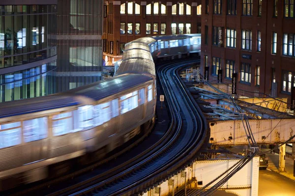 Chicago EL winds its way between buildings on its way downtown and the Loop