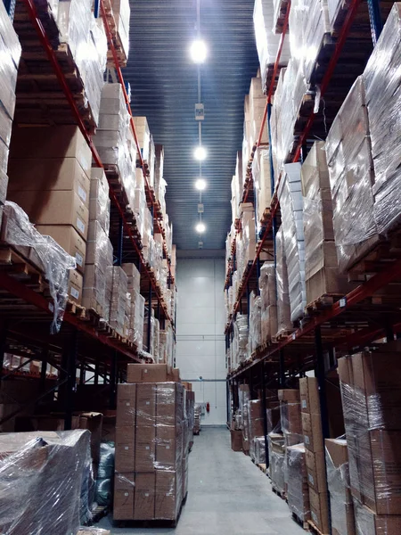 Storage racks with cardboard boxes