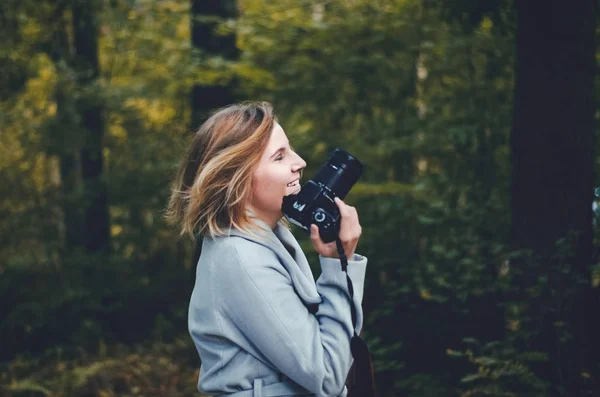 Young smiling photographer — Stock Photo, Image