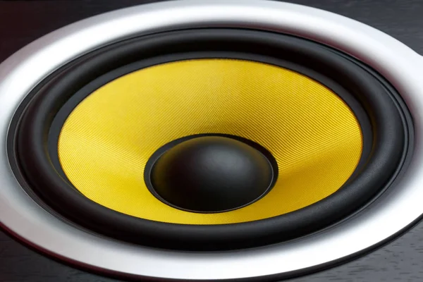 Yellow speaker loudspeaker close-up part of a musical column — Stock Photo, Image