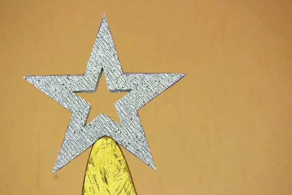 Silver handmade Christmas star closeup