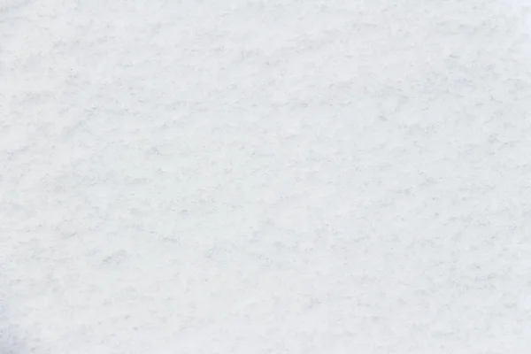 Текстура белоснежного пушистого свежего снега — стоковое фото
