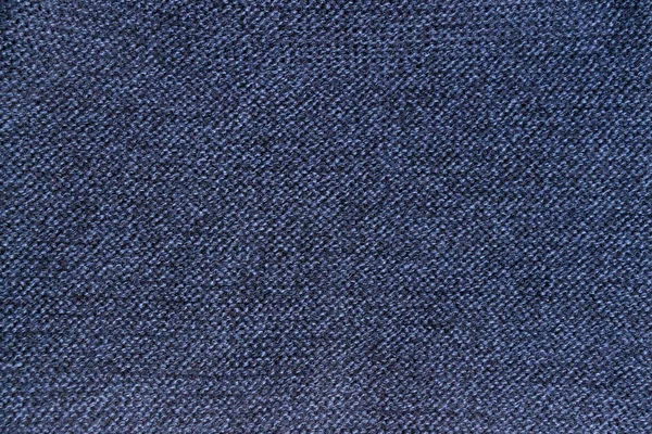 Texture of blue knitted woolen or knitted fabric. — Stock Photo, Image