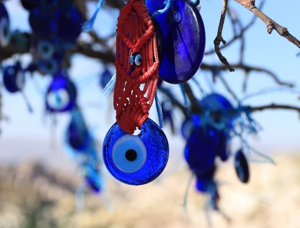 Turkish eyes hanging from a tree — Stock Photo, Image