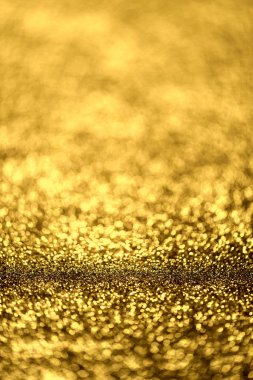 Altın glitter doku Derma bulanık arka plan