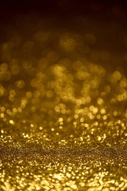 Altın glitter doku Derma bulanık arka plan