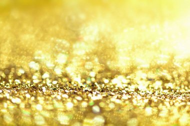 Altın glitter doku Derma bulanık arka plan 