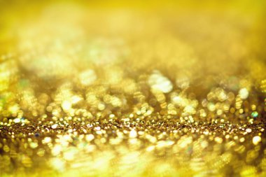 Altın glitter doku Derma bulanık arka plan 