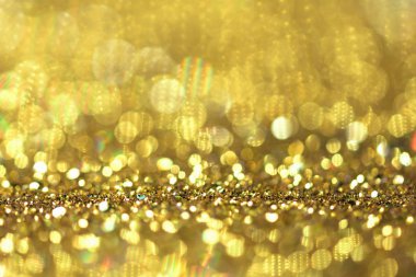 Altın glitter doku Derma bulanık arka plan 