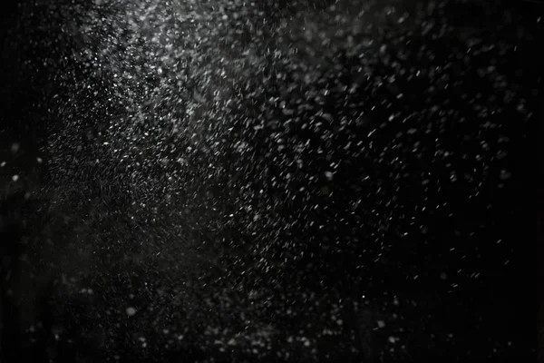 Nieve cayendo sobre el fondo negro — Foto de Stock