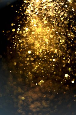 Altın glitter doku doğum günü, yıldönümü, düğün, yeni yıl arifesi ya da Noel için arka plan Derma bulanık.