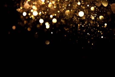 Altın glitter doku doğum günü, yıldönümü, düğün, yeni yıl arifesi ya da Noel için arka plan Derma bulanık.