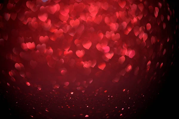 Kalp Şeklinde Kırmızı Bulanıklık Ligth Bokeh Siyah Bir Zemin Üzerine — Stok fotoğraf