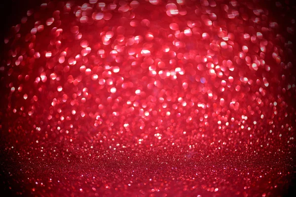 Rote glitzernde Bokeh-Lichter verschwimmen abstrakten Hintergrund für Valentinstag, Geburtstag, Jahrestag, Hochzeit, Neujahr und Weihnachten — Stockfoto