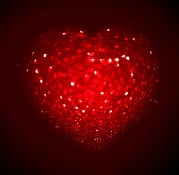 Red Blur Coração Forma Ligth Bokeh Fundo Preto — Fotografia de Stock